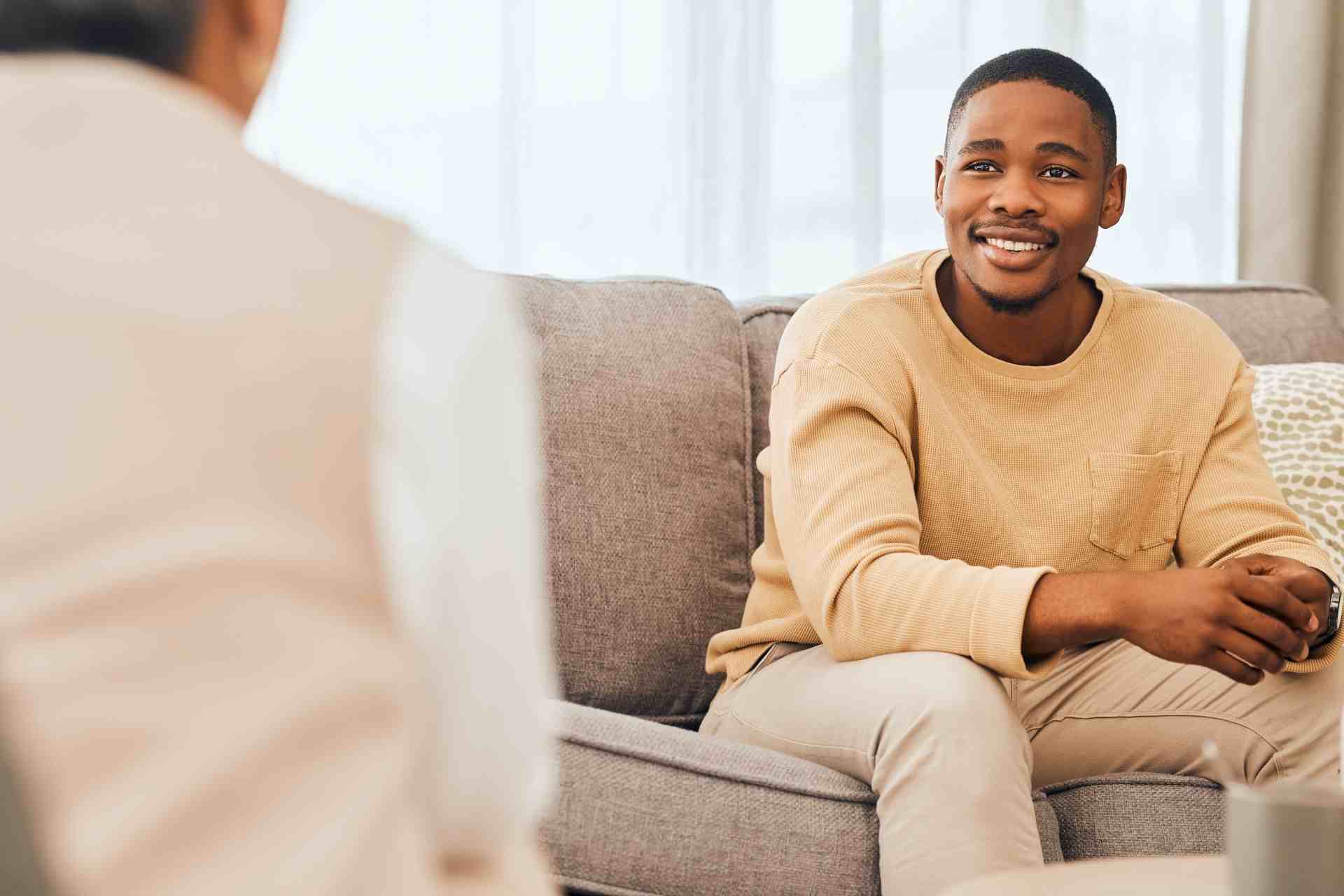 Man talking with therapist during a mental health counseling session