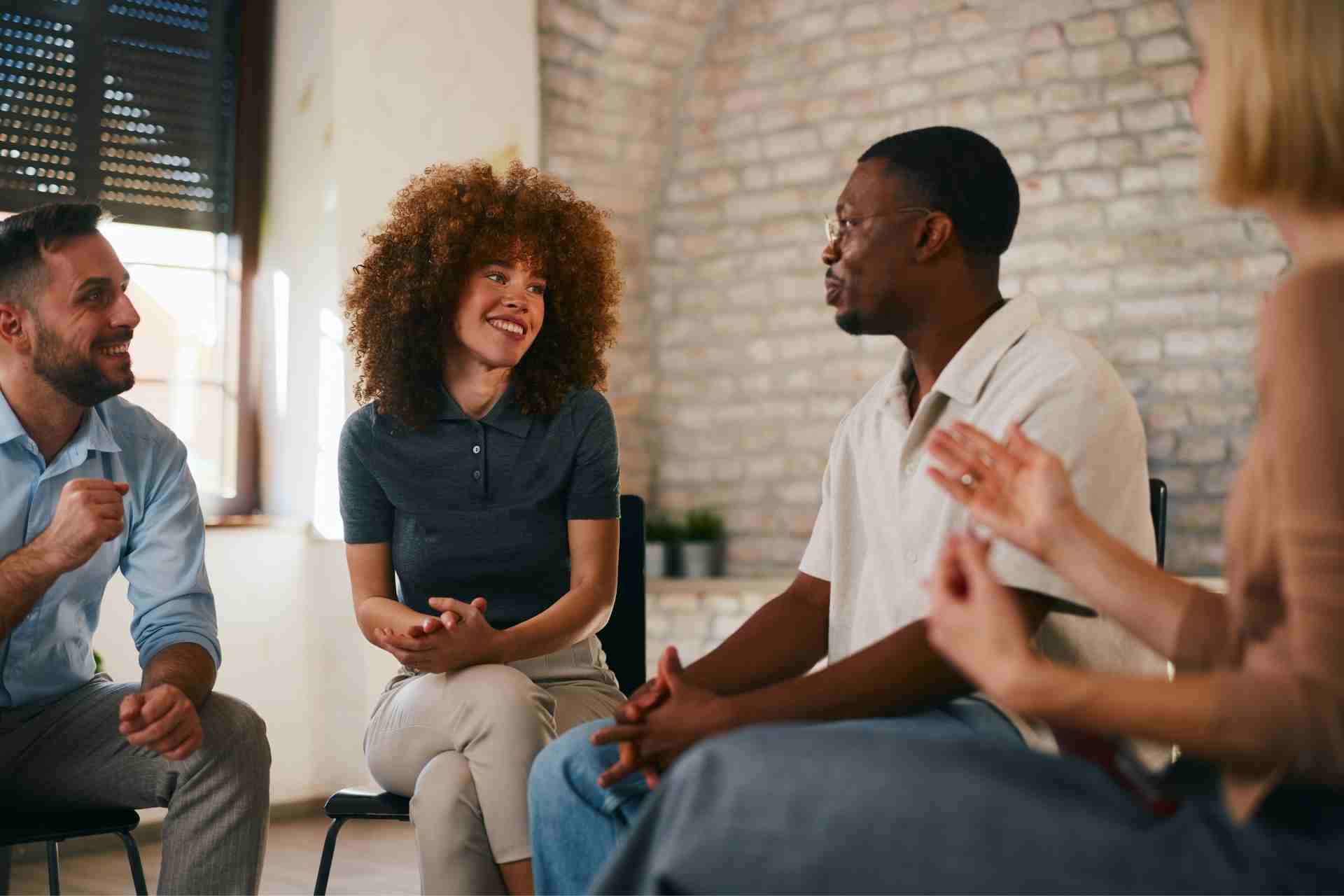 Participants engaging in group therapy during a PHP or IOP outpatient mental health treatment program.